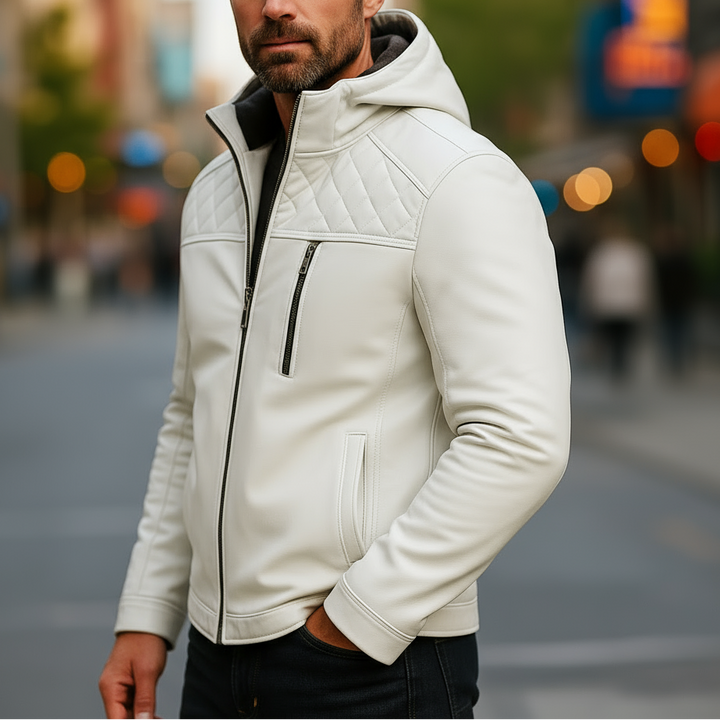 Man wearing a white quilted jacket on a city street