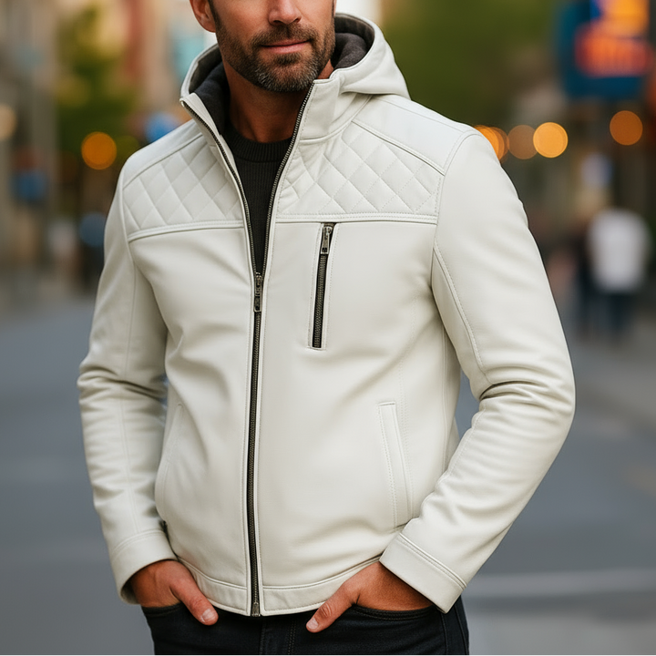 Man wearing a white quilted jacket on a city street